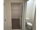 Bathroom with toilet and access to a closet at 2453 Shiprock Ct, Deltona, FL 32738