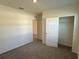 Simple bedroom with carpet and a sizable closet at 2453 Shiprock Ct, Deltona, FL 32738