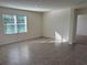 Bright bonus room with tile floors and large window at 2453 Shiprock Ct, Deltona, FL 32738