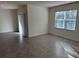 Living room with tile floors and sliding door access to outdoors at 2453 Shiprock Ct, Deltona, FL 32738