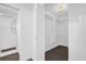 Bathroom featuring a large walk-in shower, storage space, and tile flooring at 128 W Juliana Way, Auburndale, FL 33823