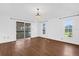 Bright bedroom with a sliding glass door and view of the backyard at 128 W Juliana Way, Auburndale, FL 33823