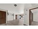 Open living space featuring new floors and large sliding glass doors that let in lots of light at 128 W Juliana Way, Auburndale, FL 33823