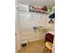 Well-organized closet with wire shelving and ample storage space for clothes and personal items at 2555 Oneida Loop, Kissimmee, FL 34747