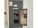 Electrical panel with electrical inspection sticker at 2555 Oneida Loop, Kissimmee, FL 34747