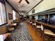 Long bar with seating in a clubhouse setting at 5021 Harbor Hts, Lady Lake, FL 32159