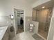 Bathroom with walk-in shower and large closet at 5021 Harbor Hts, Lady Lake, FL 32159