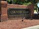 Brick and stone entrance sign, Country Club at 5021 Harbor Hts, Lady Lake, FL 32159