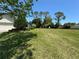 Spacious lot with a home and nicely landscaped yard at 5021 Harbor Hts, Lady Lake, FL 32159