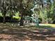 playground nestled under shady oak trees at 5021 Harbor Hts, Lady Lake, FL 32159