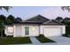 Newly built home with gray accents at 2221 Elegant Manor Cir, Edgewater, FL 32141