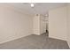 Neutral bedroom showcasing carpet flooring, smooth walls, ceiling fan and a closet at 911 N Orange Ave # 408, Orlando, FL 32801