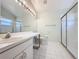 Clean bathroom with vanity, toilet, shower, and tiled floor at 3507 Tenby Cir, Clermont, FL 34711