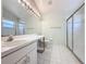 Clean bathroom with vanity, toilet, shower, and tiled floor at 3507 Tenby Cir, Clermont, FL 34711