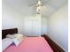 Spacious bedroom with wood-look floors and a double bed at 3507 Tenby Cir, Clermont, FL 34711