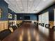 Spacious meeting room with large table and comfortable seating at 3507 Tenby Cir, Clermont, FL 34711