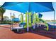 Fun playground featuring slides, climbing structures, and a covered area for shade at 2054 Rome Dr, Kissimmee, FL 34747