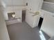Upper view of the living room shows the open floorplan and view to the second story at 5450 Watervista Dr, Orlando, FL 32821