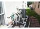 A view of the pool equipment, including filter and AC unit, situated beside the house at 5450 Watervista Dr, Orlando, FL 32821