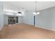 Spacious room with wood flooring, fan, large windows, sliding doors and recessed lights at 2205 Cypress Cove Dr, Tavares, FL 32778
