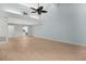 Spacious living room with vaulted ceiling and open floor plan at 2205 Cypress Cove Dr, Tavares, FL 32778