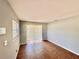 Versatile empty room featuring tile flooring, a window, and sliding glass door at 544 S Cottage Hill Rd, Orlando, FL 32805