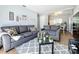 Cozy living room featuring neutral walls, stylish decor, and an open layout at 544 S Cottage Hill Rd, Orlando, FL 32805