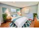 Comfortable primary bedroom with modern decor, including accent wall art at 544 S Cottage Hill Rd, Orlando, FL 32805