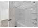Bathroom features a bright tub and shower combination at 2633 Hancock Crossing Dr, Bartow, FL 33830