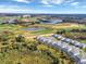 Community overview with golf course and lake at 8831 Interlocking Ct, Davenport, FL 33896