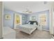 Bedroom with a queen-size bed and ceiling fan at 8831 Interlocking Ct, Davenport, FL 33896