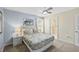Bedroom with a queen-size bed and ceiling fan at 8831 Interlocking Ct, Davenport, FL 33896