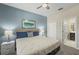 King-size bedroom with ensuite bathroom access at 8831 Interlocking Ct, Davenport, FL 33896