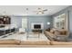 Spacious living room with comfortable seating and large TV at 8831 Interlocking Ct, Davenport, FL 33896