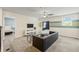 Spacious loft with comfortable seating and a large TV at 8831 Interlocking Ct, Davenport, FL 33896