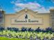 Hammock Reserve community entrance sign with lush landscaping and a welcoming aesthetic at 5583 Maddie Dr, Haines City, FL 33845