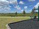 Park with walking trails, benches and views of the Florida countryside at 5583 Maddie Dr, Haines City, FL 33845