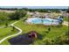 Community playground area including swings, slides, and benches at 5583 Maddie Dr, Haines City, FL 33845