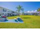 Community features lush lawn, grill, and picnic table at 1048 Plantation Dr # E-9, Kissimmee, FL 34741