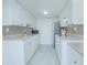 Bright and updated kitchen with white cabinets at 1048 Plantation Dr # E-9, Kissimmee, FL 34741