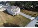 New construction home with gray roof and paver driveway at 124 Lake Dr, Oviedo, FL 32765