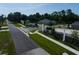 Aerial view of a new residential community entrance at 124 Lake Dr, Oviedo, FL 32765