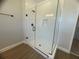 Large walk-in shower with glass enclosure and modern fixtures at 124 Lake Dr, Oviedo, FL 32765