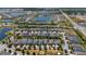 Aerial view of a residential community with lakes and landscaped streets at 4904 W Fountainwood Dr, St Cloud, FL 34772