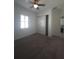 Bedroom with a window and closet with sliding doors at 4904 W Fountainwood Dr, St Cloud, FL 34772