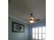 Bedroom with a ceiling fan and shuttered window at 4904 W Fountainwood Dr, St Cloud, FL 34772