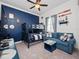 Nautical themed bedroom featuring a bunk bed, sofa, and decorative oars at 4904 W Fountainwood Dr, St Cloud, FL 34772