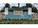 Elegant Twin Lakes entrance sign featuring water feature and landscaping at 4904 W Fountainwood Dr, St Cloud, FL 34772
