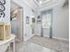 Elegant foyer with decorative rug, stylish lighting, and a welcoming atmosphere at 4904 W Fountainwood Dr, St Cloud, FL 34772