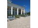 Upscale poolside seating area at the community clubhouse with lounge chairs and manicured landscaping at 4904 W Fountainwood Dr, St Cloud, FL 34772